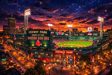 Fenway Park at sunset with city skyline in the background